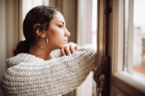 Girl looking out the window