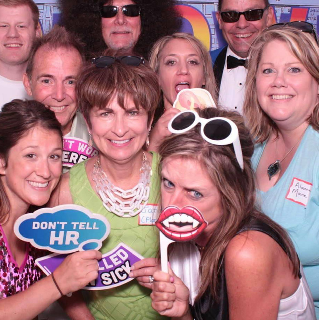 Employees in photobooth