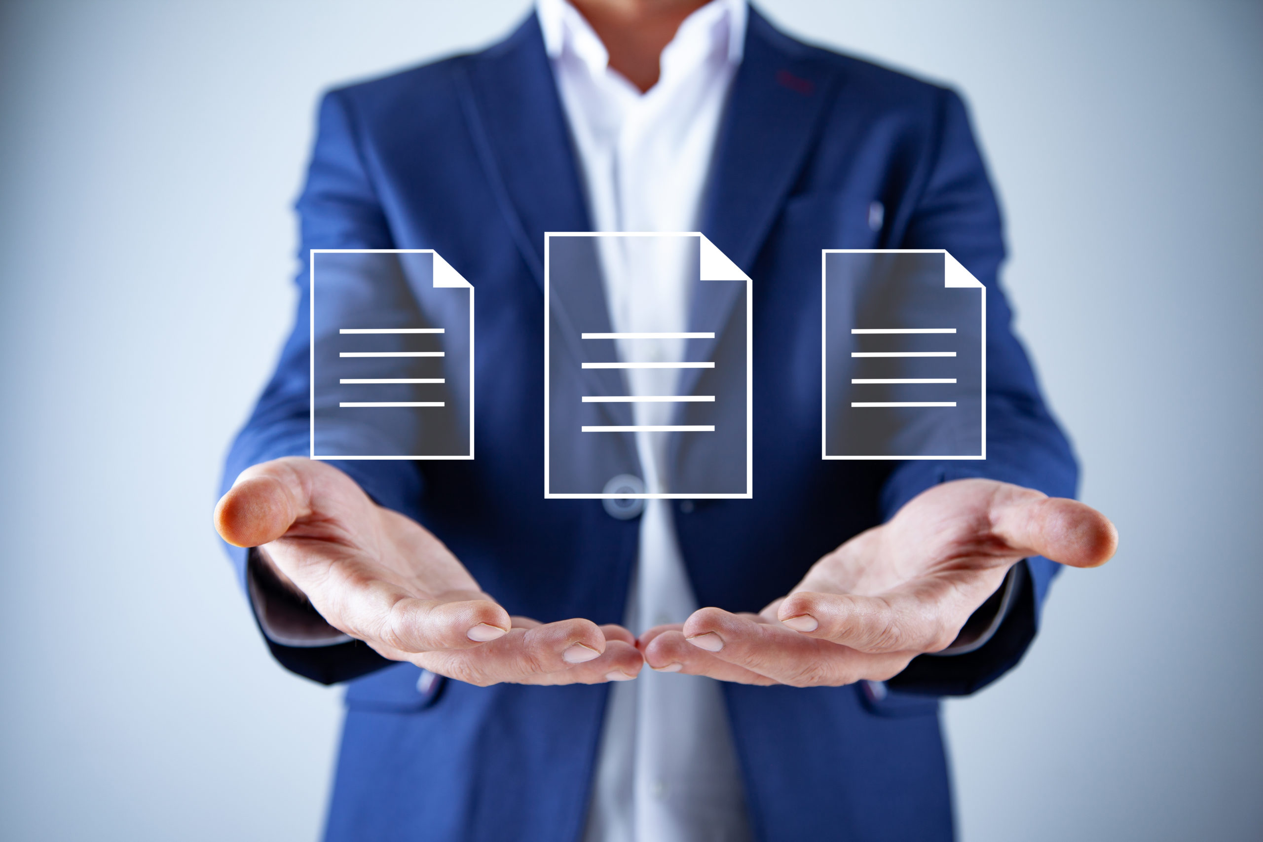 Photo of businessman with open hands and digital paperless icons