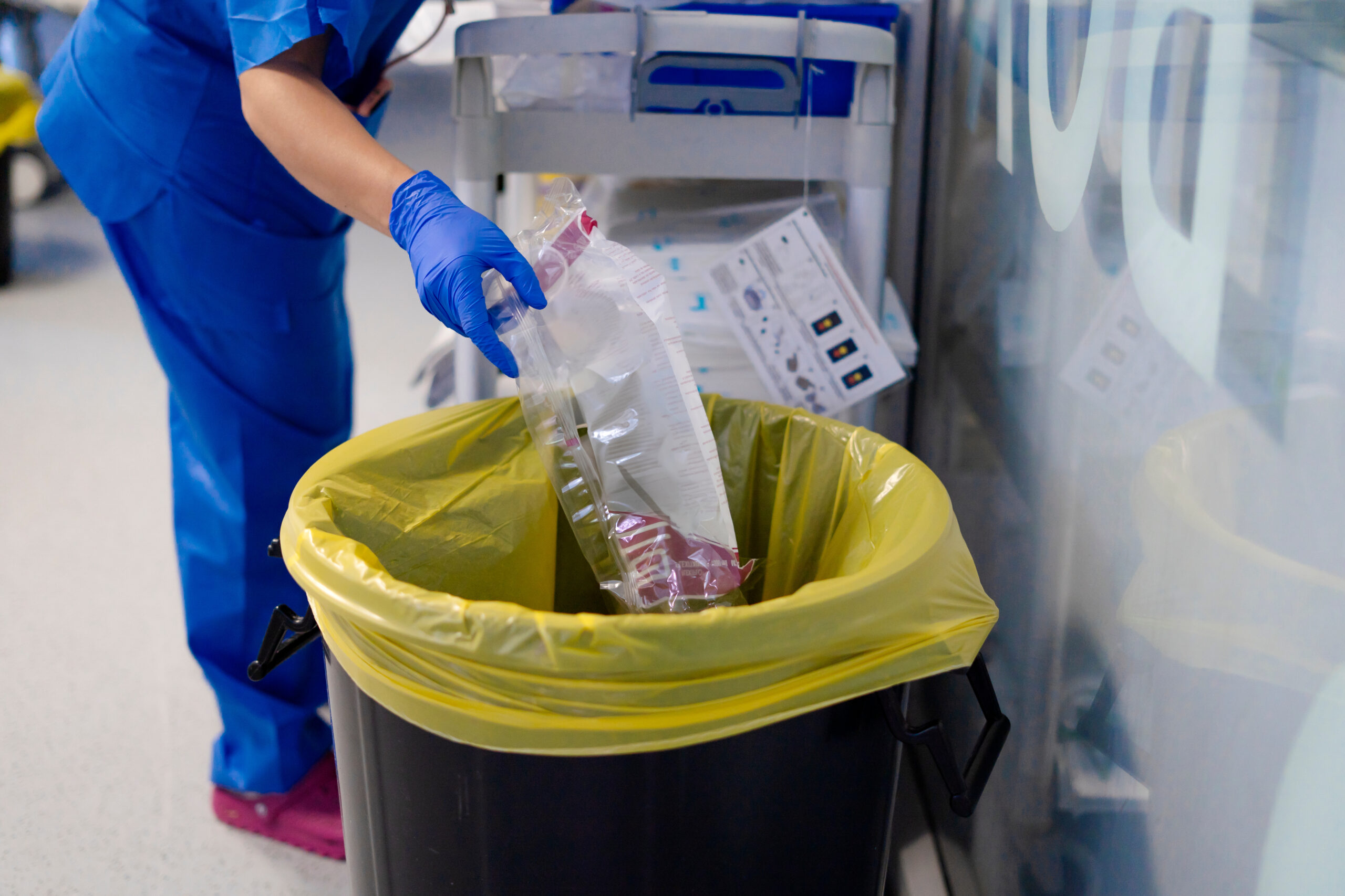 Nurse disposing med waste