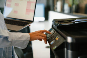 business professional at a printer